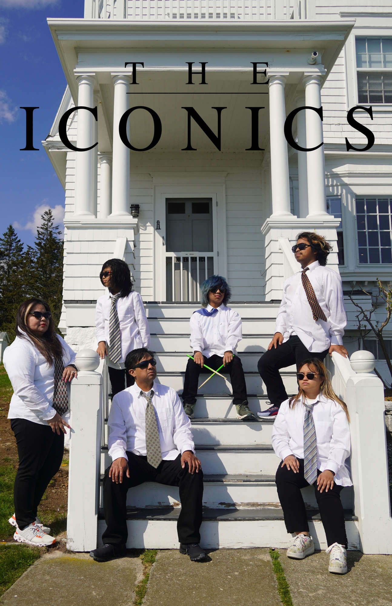 A band posing on stairs with the words "The Iconics" written above them.