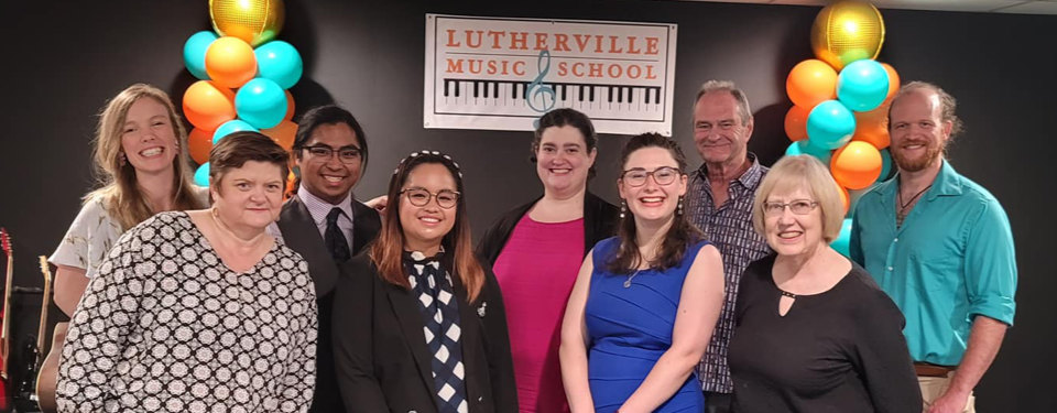 Lutherville Music School staff posing for a group picture.