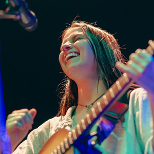 Rachel McNear performing on stage.