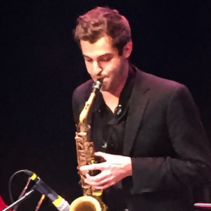 A photo of Dustyn DeBemardo performing on stage.